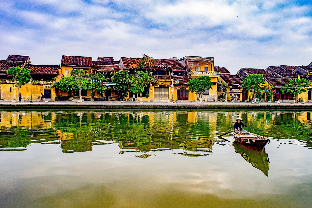 Colorful silk lanterns illuminating the ancient streets of Hoi An at night.